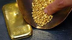 gold bar and gold nuggets